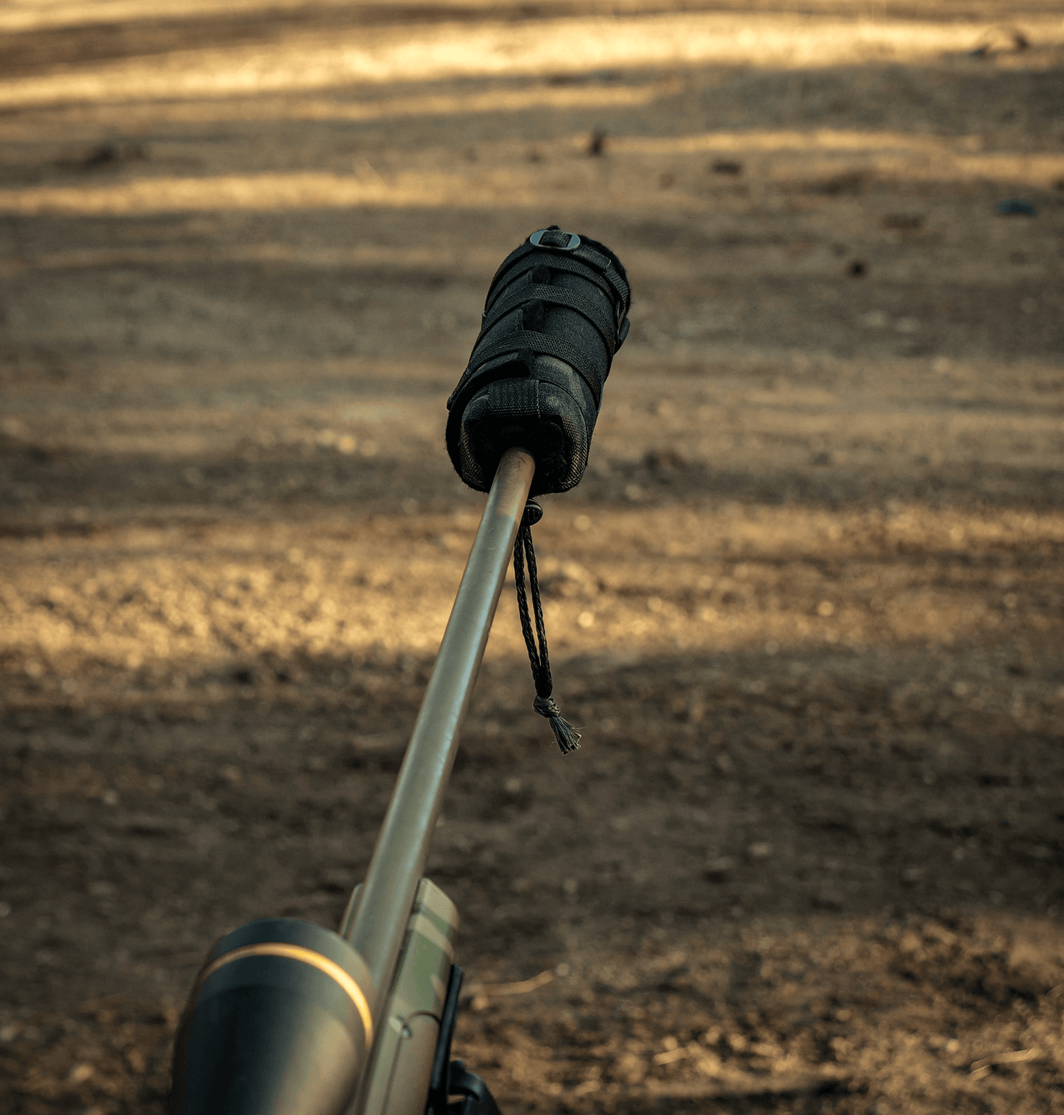 MultiCam Black T & K Suppressor Cover being used on MultiCam bolt action rifle