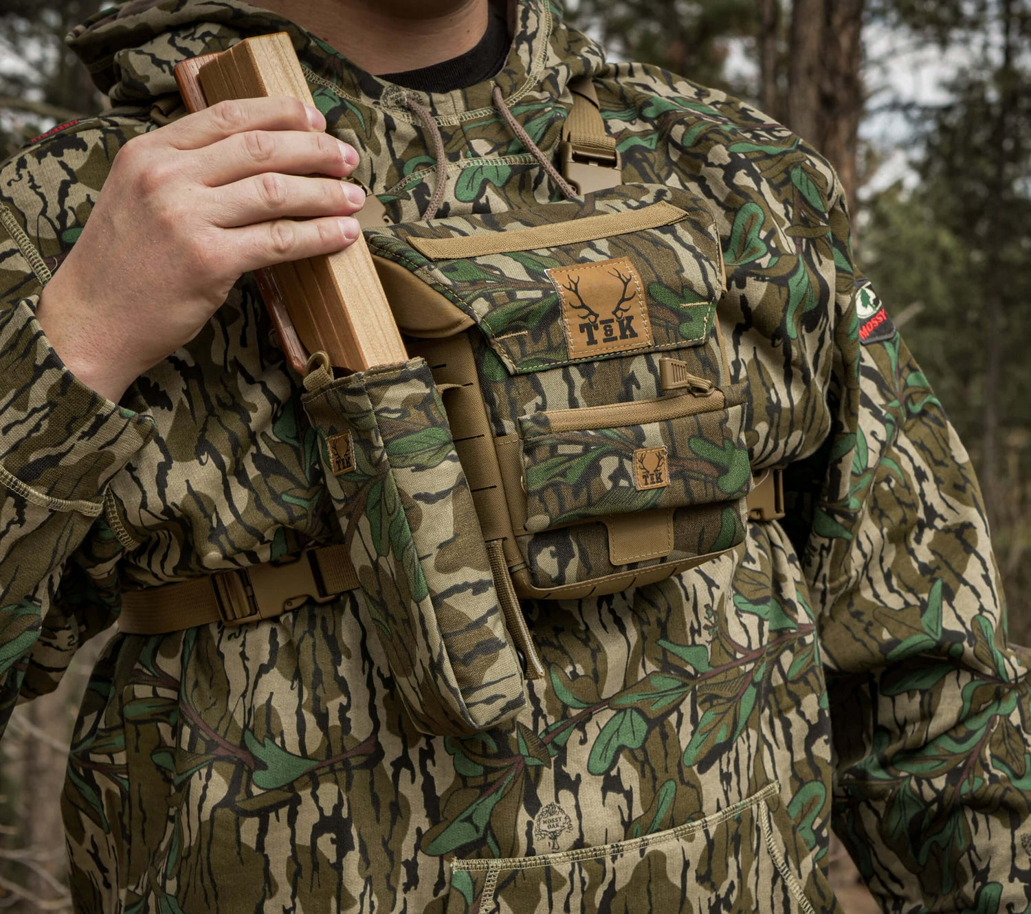 Mossy Oak Green Leaf T & K Turkey Chest Rig with Gen 3.1 Bino Harness and gear pouches being used in the field