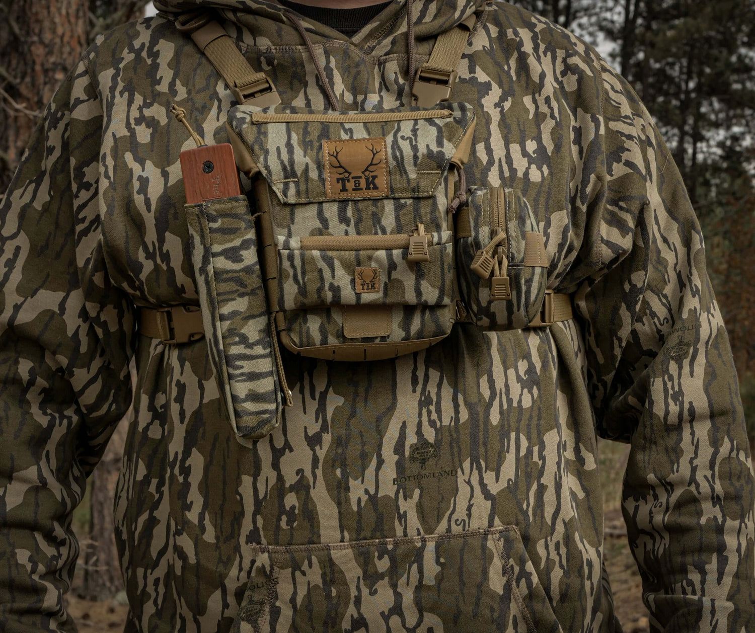 Mossy Oak Original Bottomland T & K Turkey Chest Rig with Gen 3.1 Bino Harness and gear pouches being used in the field