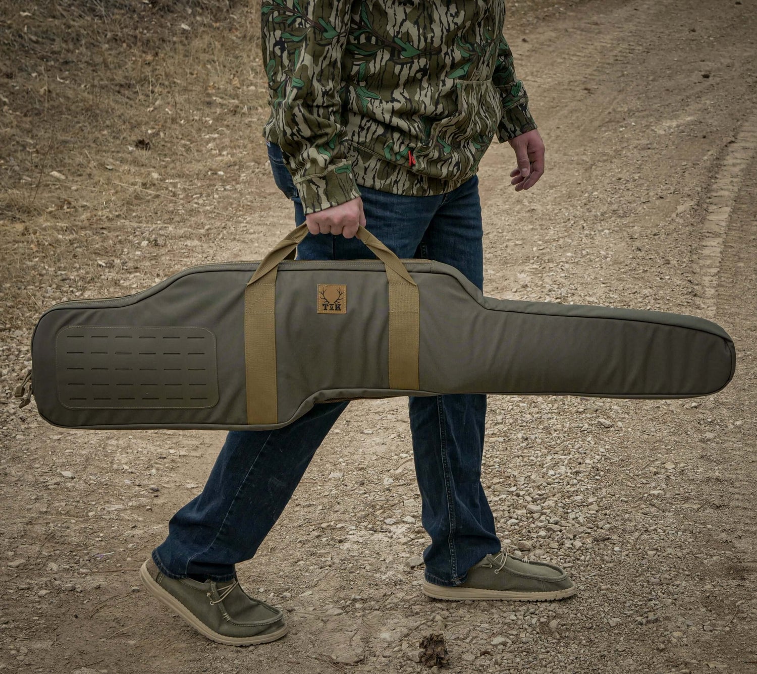 Ranger Green T & K Rifle Case being carried by handles
