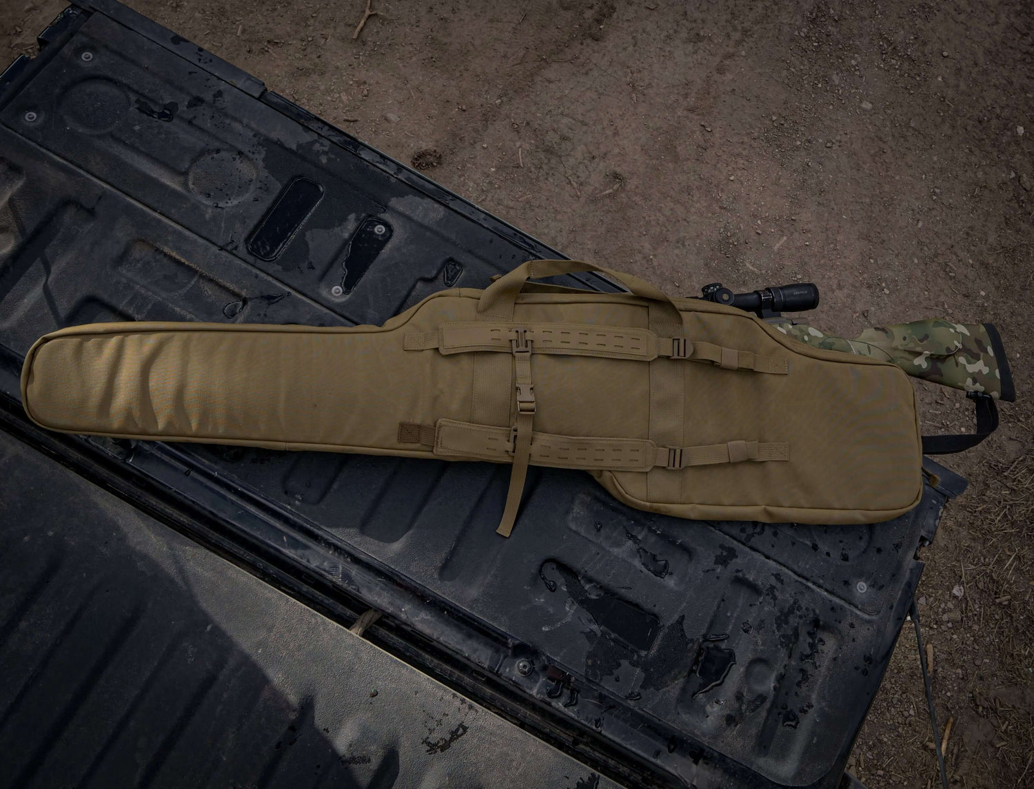 Coyote Brown T & K Rifle Case on the back bed of a truck