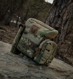 T & K Gen 3.1 Bino Harness in Multi Cam with several pouches attached to the side