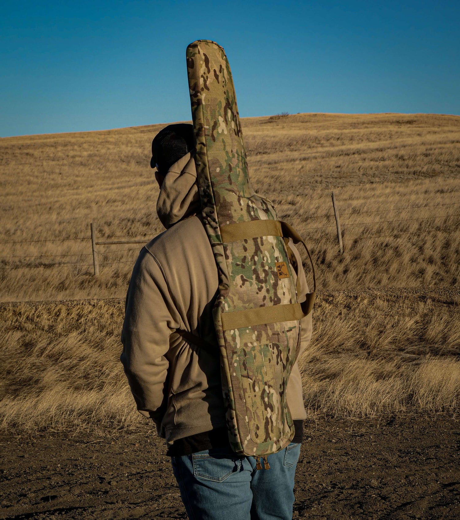 MultiCam T & K Rifle Case being carried by shoulder straps